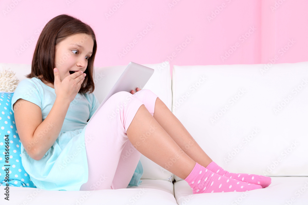 Beautiful little girl sitting