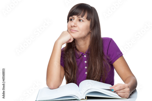attractive caucasian thoughtful girl with book