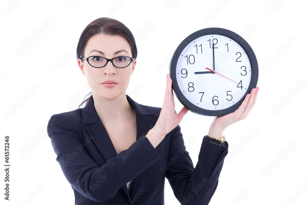young woman in business suit holding office clock isolated on wh young woman in business suit holding office clock isolated on wh