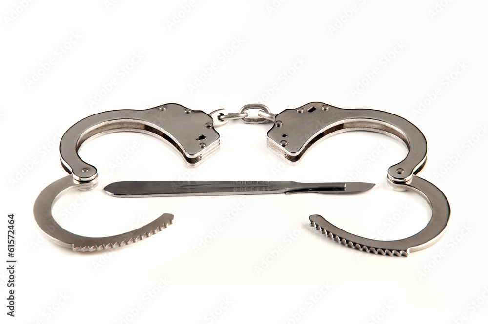 isolated cuffs with lancet middle inside on white background isolated cuffs with lancet middle inside on white background