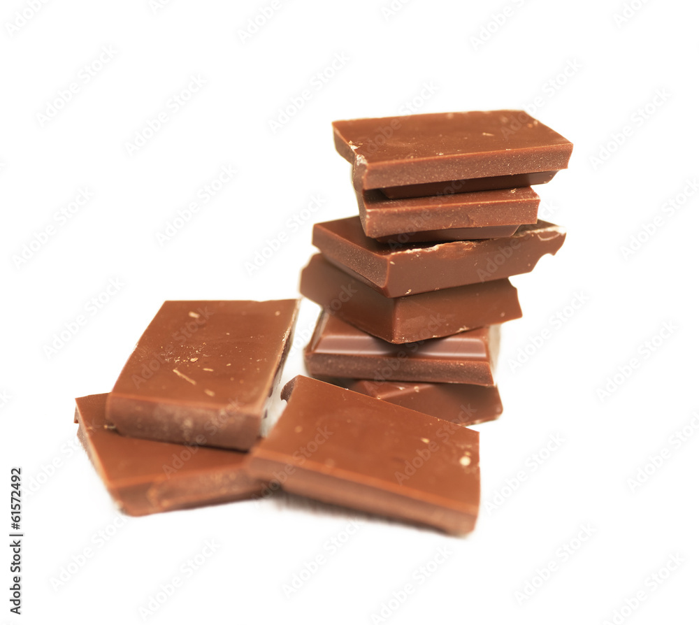 chocolate bar broken into pieces in the form of a tower, isolate chocolate bar broken into pieces in the form of a tower, isolate