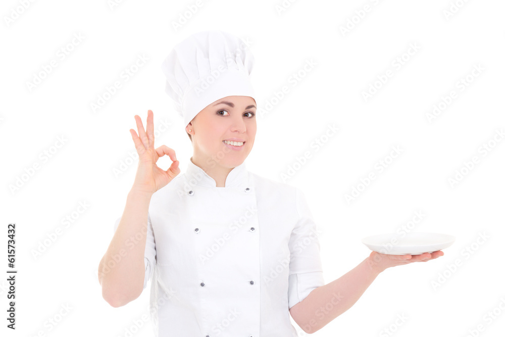 portrait of young cook woman in uniform with empty plate showing portrait of young cook woman in uniform with empty plate showing