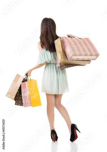 Rear view of Asian shopping woman