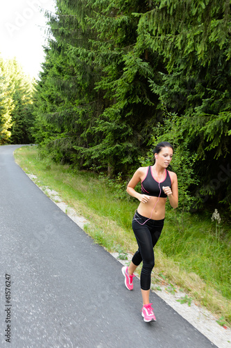 Athlete woman training for marathon run