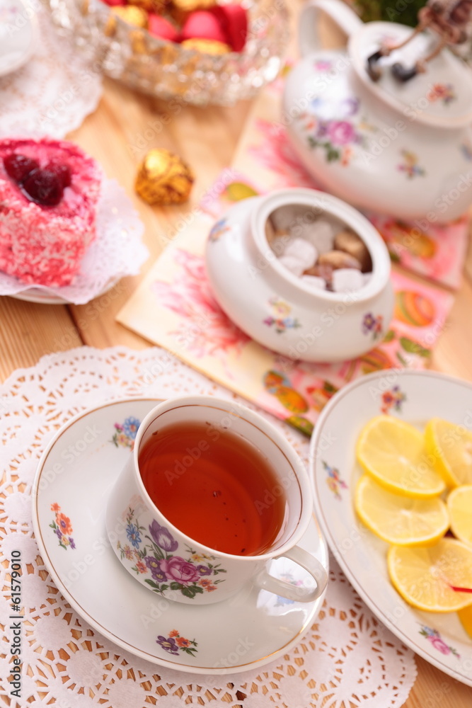 Warm cup of tea and sweets Warm cup of tea and sweets