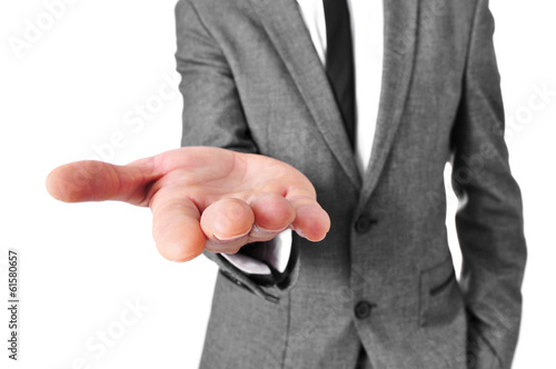 man in suit with his hand open