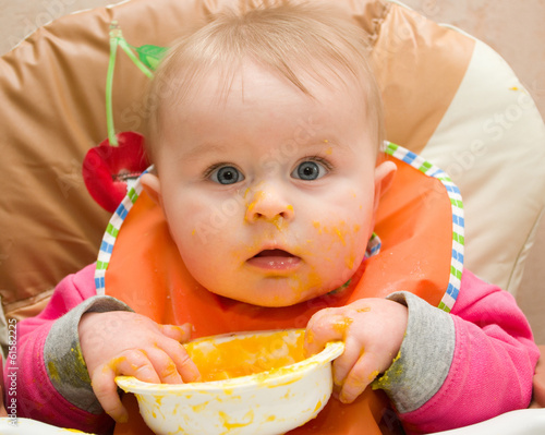First one-year infant's meal by himself