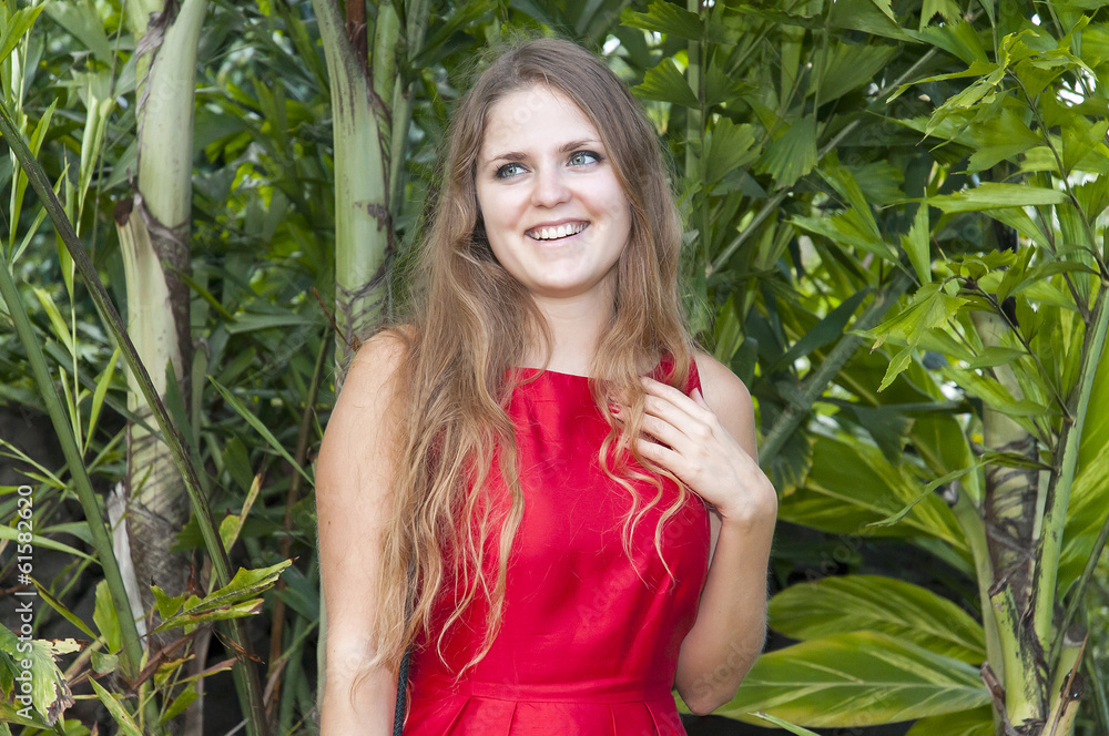 Beautiful Young Woman In A Red Dress. Tenerife. Park Taoro. Beautiful Young Woman In A Red Dress. Tenerife. Park Taoro.