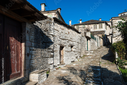 Street and houses in a traditional village of Epirus, Greece photo