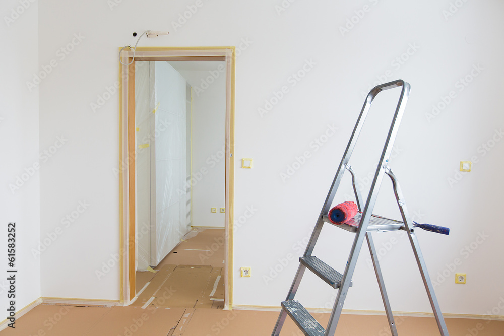 Ladder and red roller, home renovation
