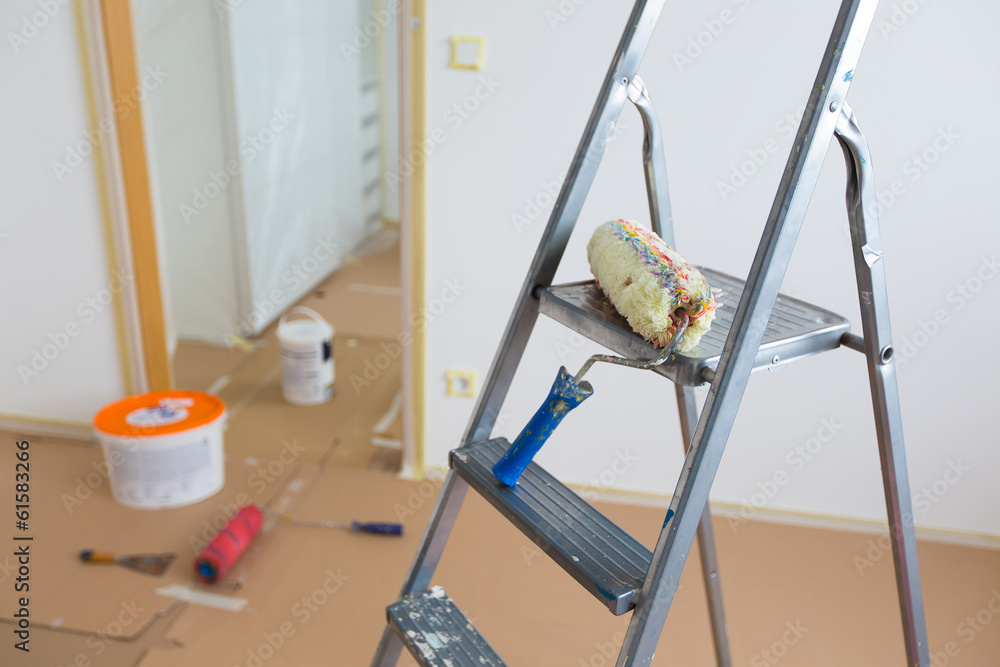 Ladder, roller and buckets, home renovation