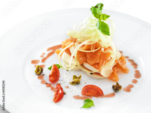 Smoked salmon with mozzarella cheese served with pomegranate sau