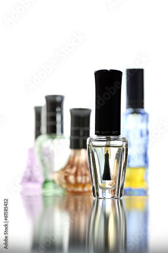 Many Bottle with Perfume different color isolated.