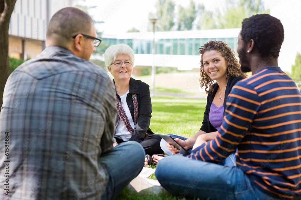 University Professor Helping Students Outdoors University Professor Helping Students Outdoors
