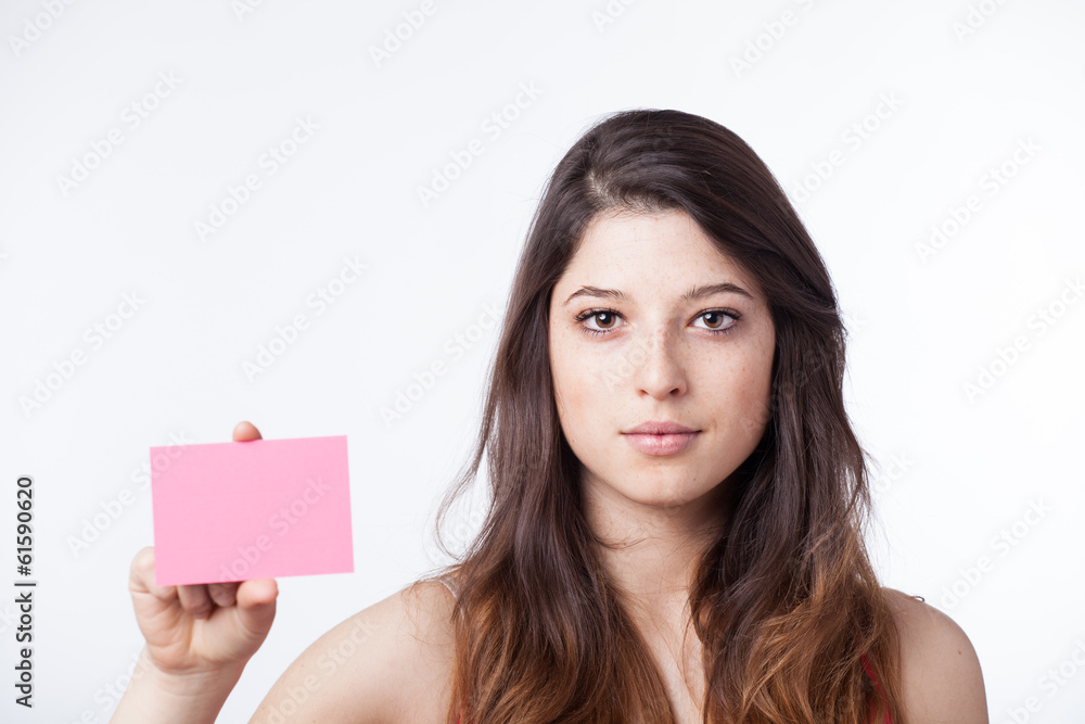 Pretty girl holding a paper note Pretty girl holding a paper note