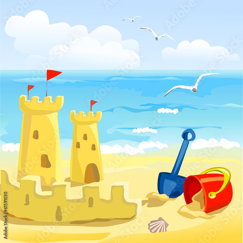 beach with children's toys and sandcastles