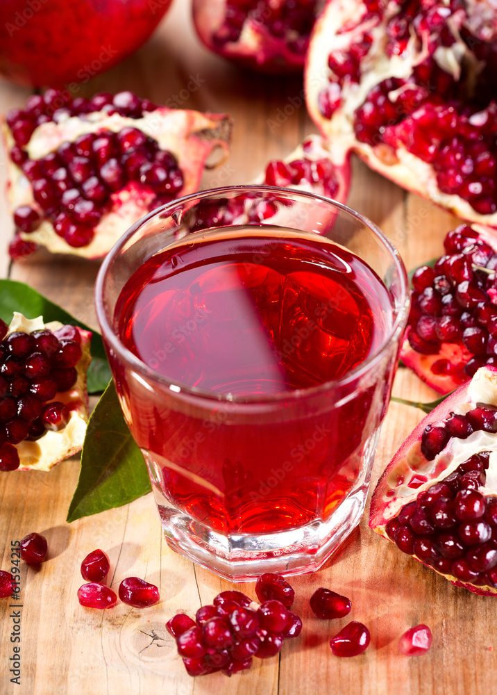glass of pomegranate juice with fresh fruits glass of pomegranate juice with fresh fruits