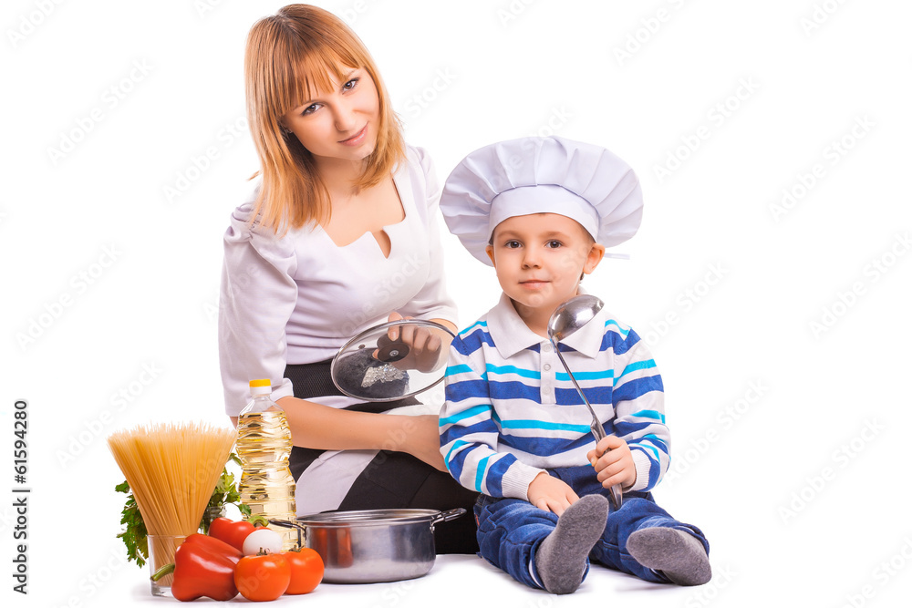 happy mom and baby are cooking on the kitchen. isolated