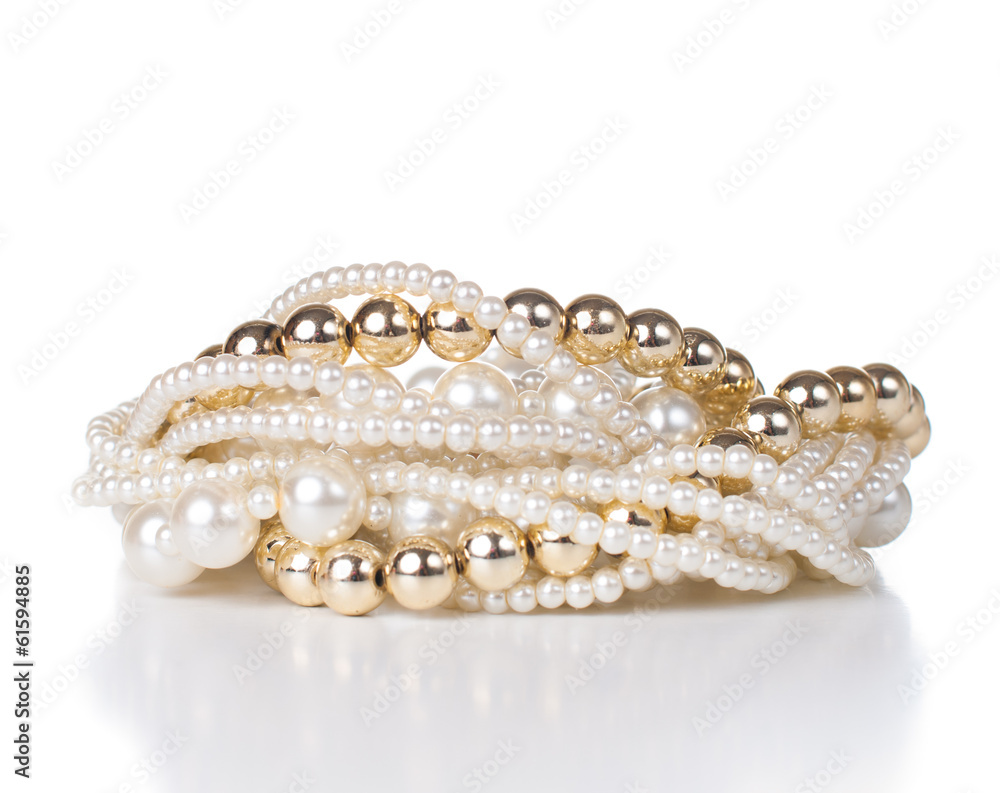 jewelry made of gold and white pearls jewelry made of gold and white pearls
