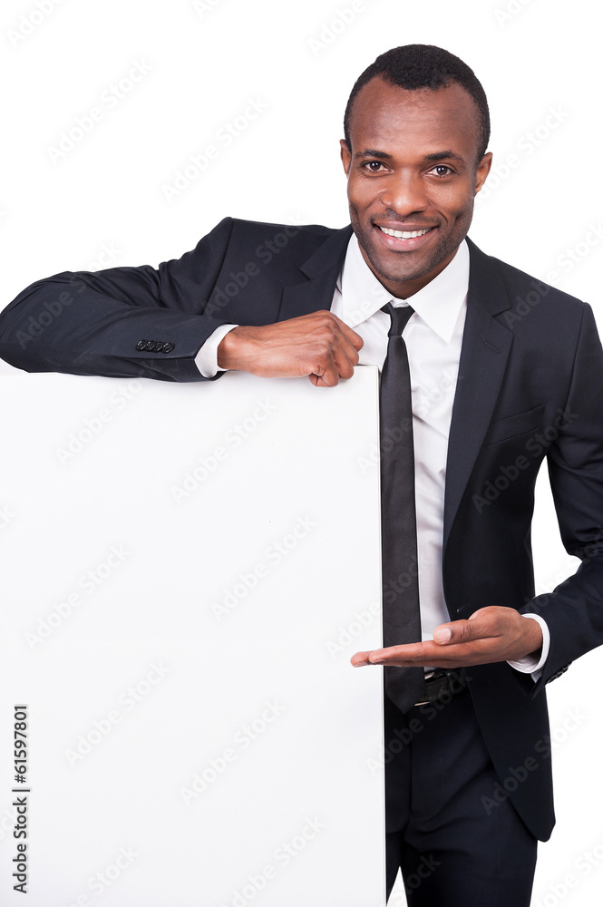 Businessman pointing a copy space. Businessman pointing a copy space.