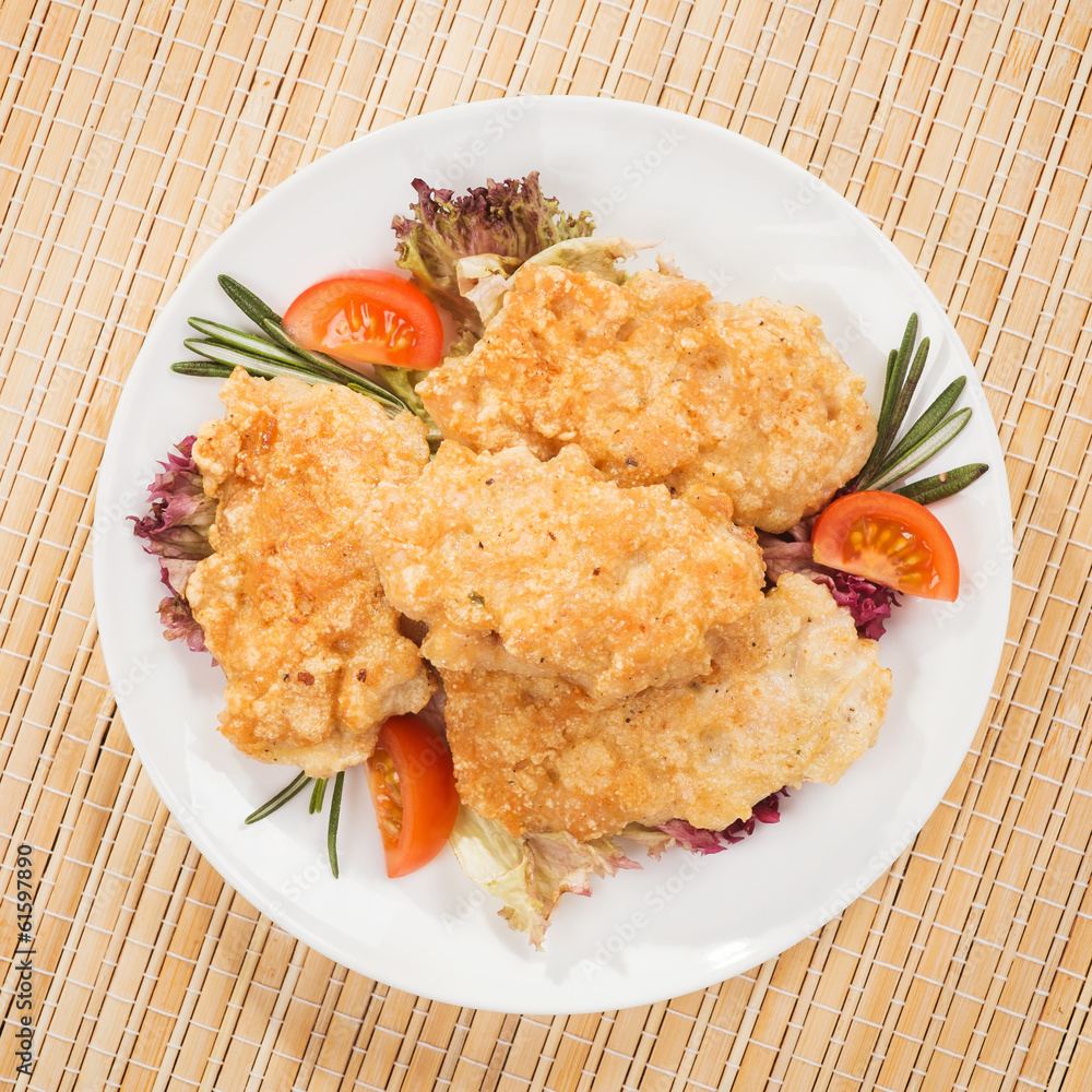 Chicken cutlets with vegetables. Top view Chicken cutlets with vegetables. Top view