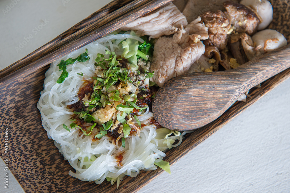Delicious Noodle served with wooden plate Delicious Noodle served with wooden plate