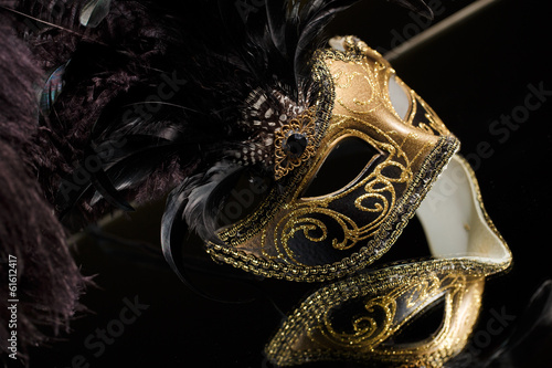 The Venetian masks with ornament over black background