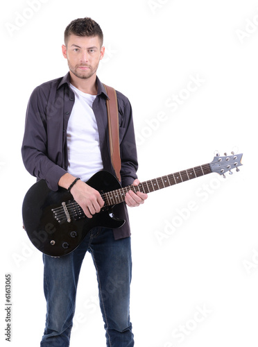 Young musician playing  guitar, isolated on white