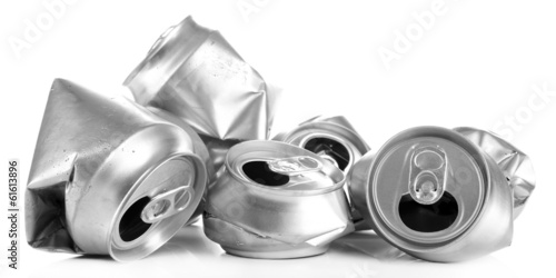 Crushed metal beer cans isolated on white photo
