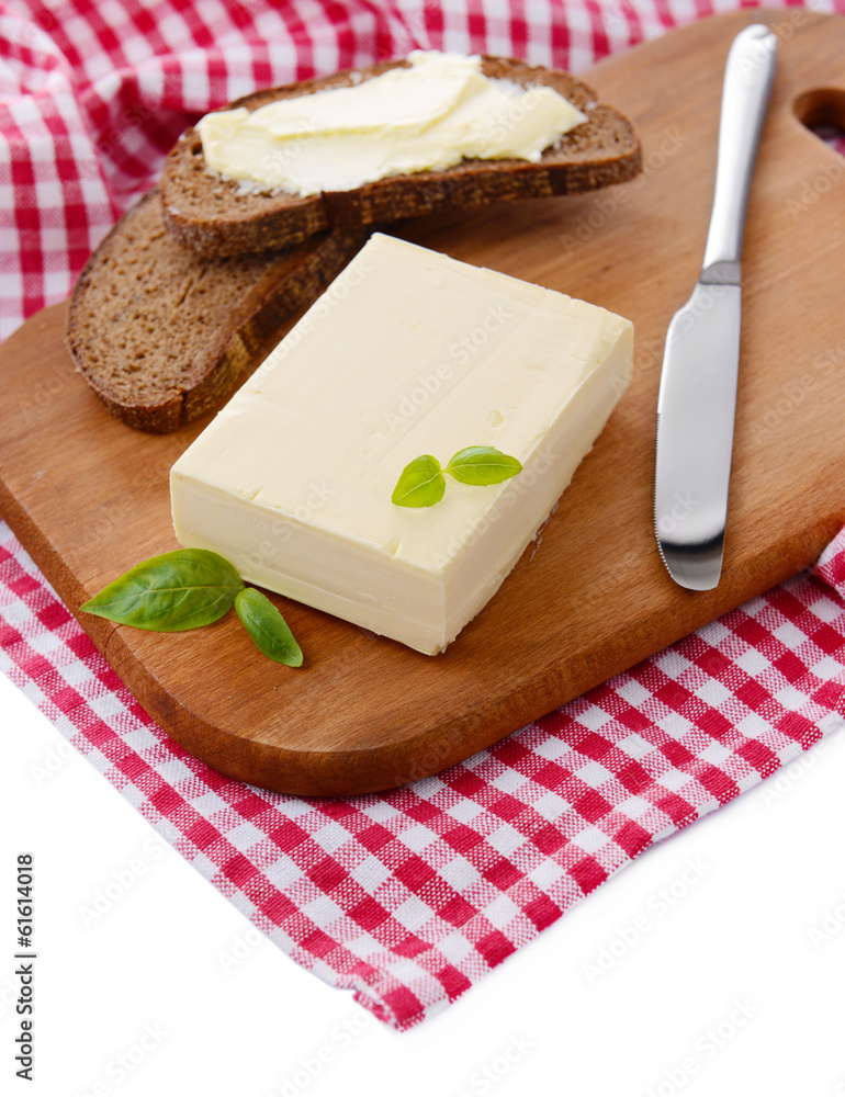 Slice of rye bread with butter, isolated on white