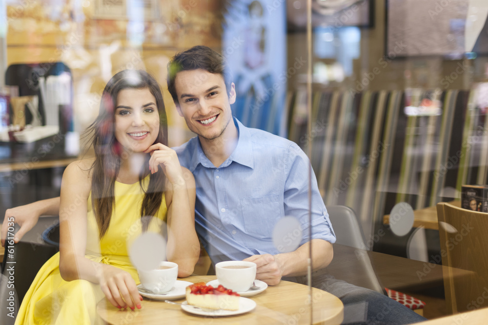 Portrait of beautiful couple in cafe