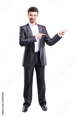 Happy business man presenting with copy space for your text