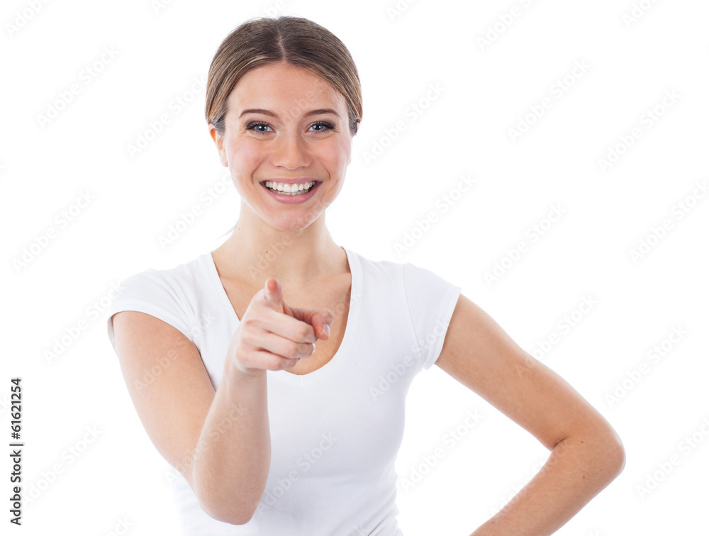 Happy woman pointing in the front Happy woman pointing in the front