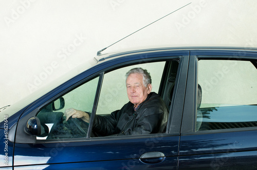 Old man in car