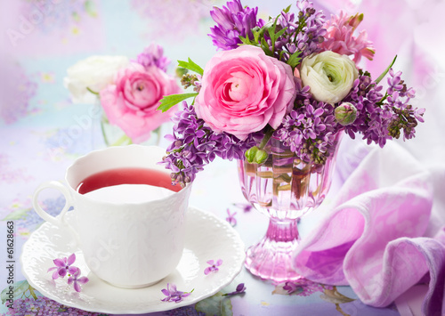 Spring flowers and cup of tea