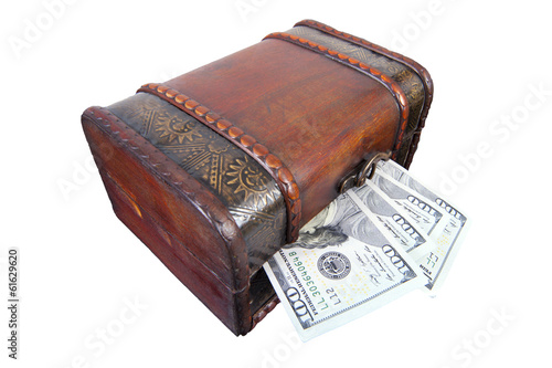 dollars in treasure box isolated on white