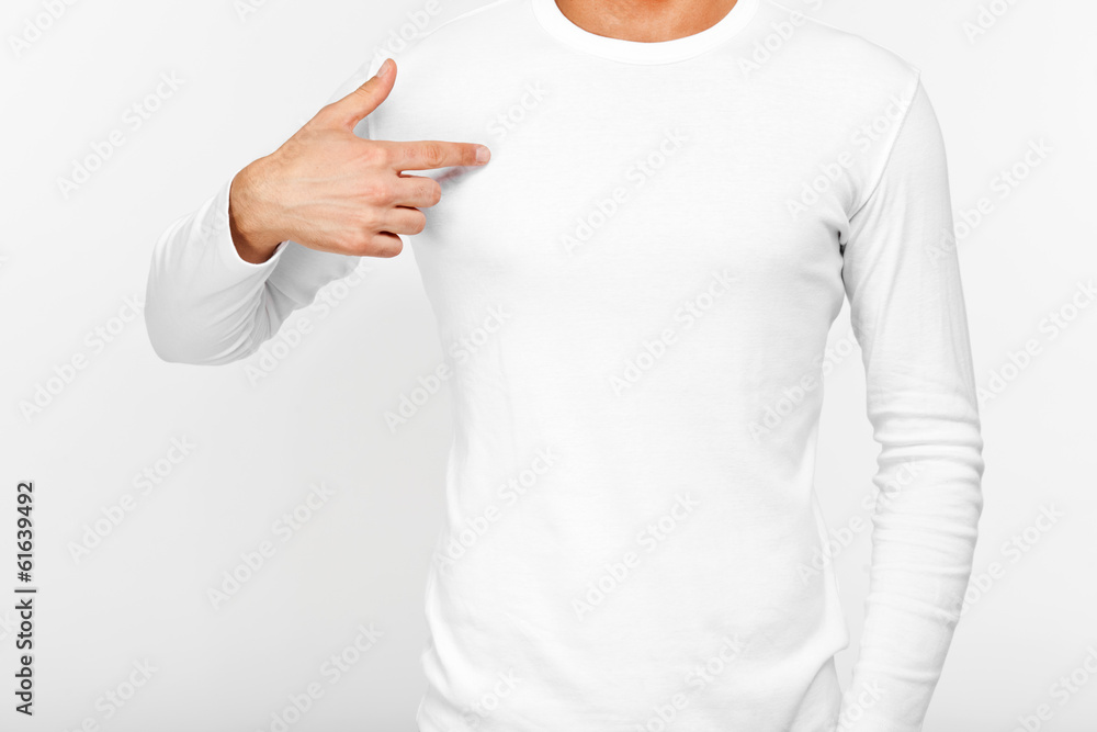 © Minerva Studio - Close-up of a man pointing his fingers on a blank t-shirt © Minerva Studio - Close-up of a man pointing his fingers on a blank t-shirt