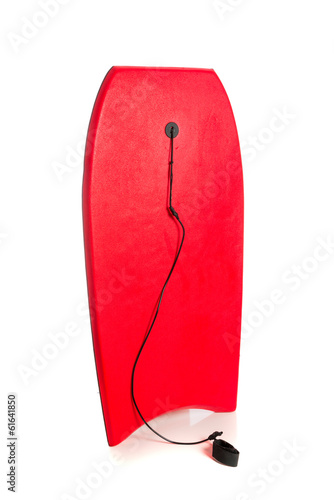 Red boogie board on white