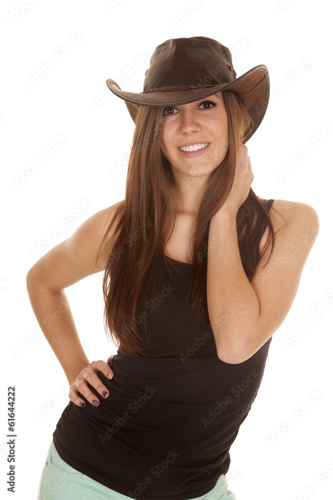 woman black tank hat hand on neck woman black tank hat hand on neck