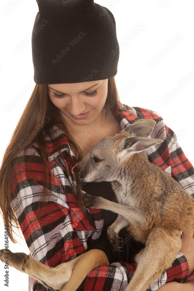 Obraz premium woman in beanie and plaid shirt baby kangaroo