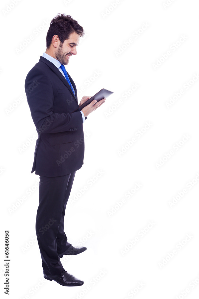 Handsome latin business man with tablet computer, isolated on a Handsome latin business man with tablet computer, isolated on a