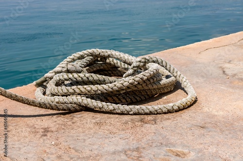 Heap of rope for mooring at a quay