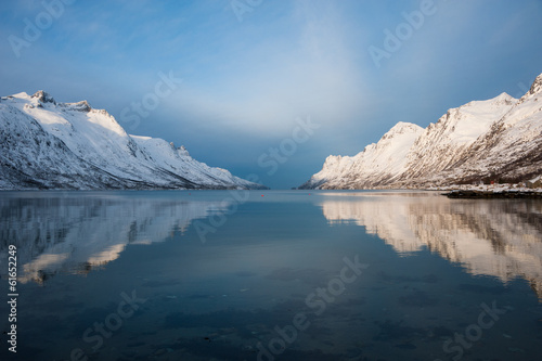 Morning reflection of the mountain at Ersfjordbotn, Norway.