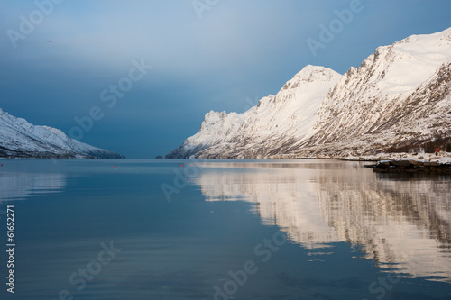 Reflection of the mountain at Ersfjordbotn, Norway.