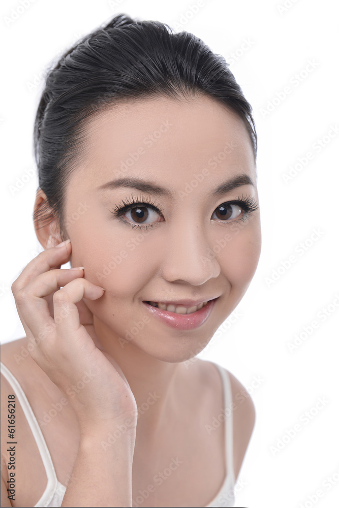 Young beauty clean female face over white