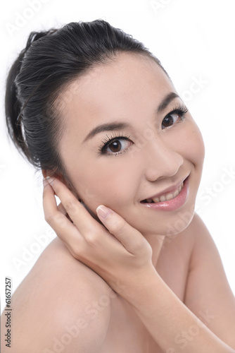 Close-up portrait of cheerful young asian girl - looking up