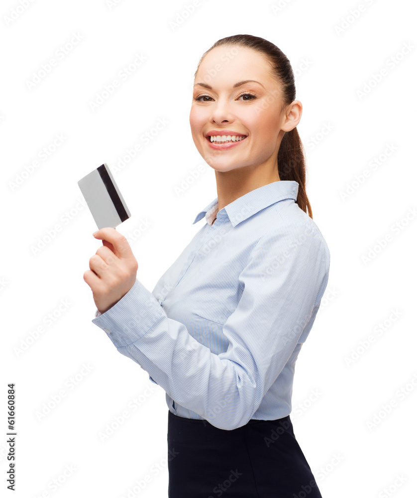 smiling businesswoman showing credit card