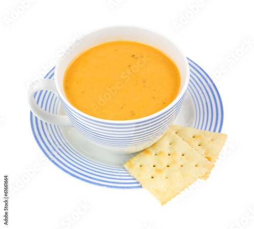 Coffee cup with gouda cheese soup