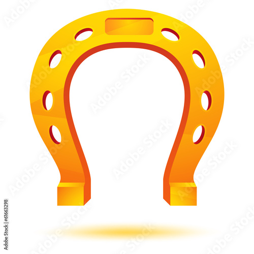 Gold horseshoe isolated on white
