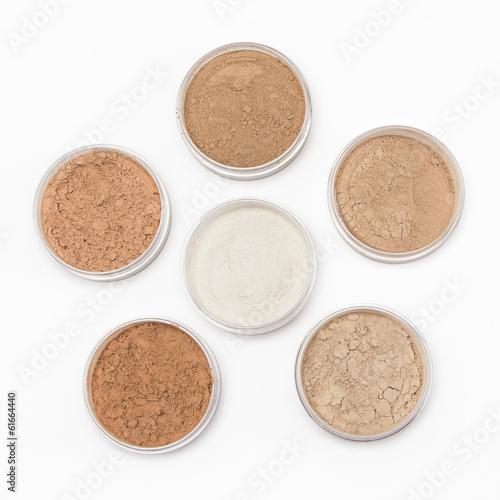 Loose cosmetic powder in jars